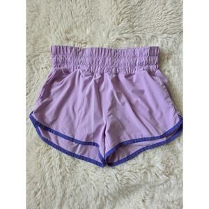 Athleta Girl Purple Run Free Dolphin pull on lined Shorts with pockets size M